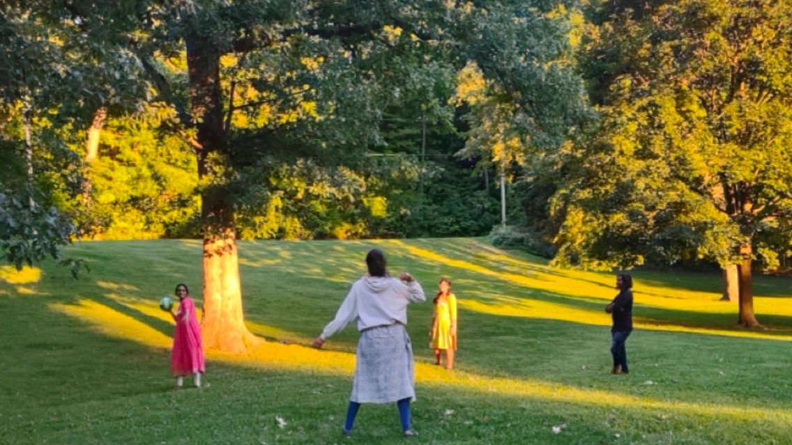 Members of the International Student Association toss a ball around during one of their get-togethers