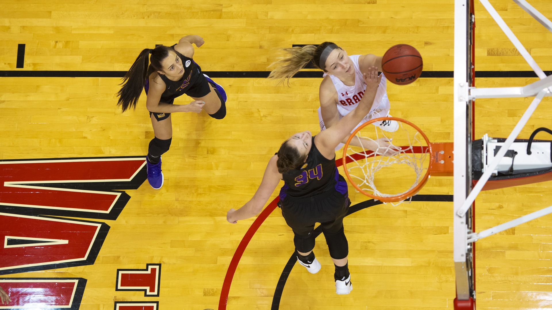 Bradley Braves women basketball player making a layup
