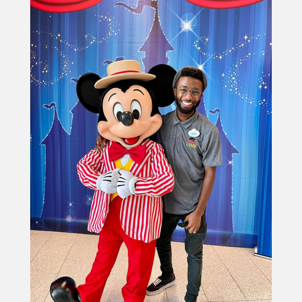 Josiah Williams with Mickey Mouse