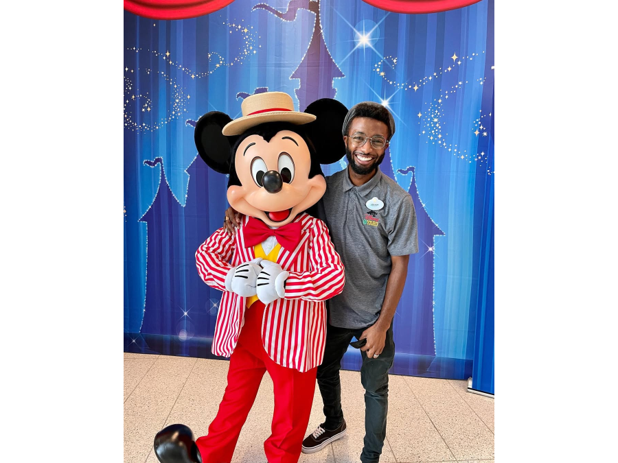 Josiah Williams with Mickey Mouse