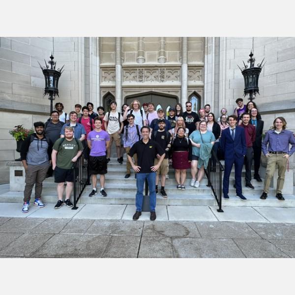 Bradley CS 390 students pose with a representative from Caterpillar